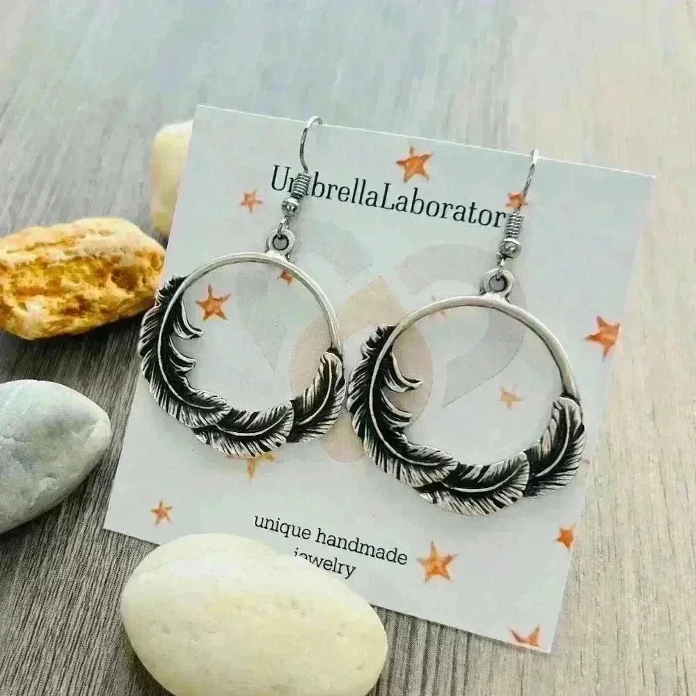 Feathered native American hoop earrings - Picture 9 of 10